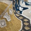 Tela Colosos Azul Gastón y Daniela figuras étnico tapicería decoración salón detalle