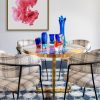 Tela Lucas Gastón y Daniela sillas tapizadas diseño cuadros As Interiorista decoración casa