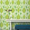 Papel pintado vinílico Ikat verde colección Librería Gastón y Daniela étnico geométrico decoración salón dormitorio baño cocina