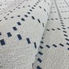 GDT-5784-005 Tela Etria blanco y azul de Gaston y Daniela. Diseño geometrico para tapiceria. Decoracion de interiores. Detalle